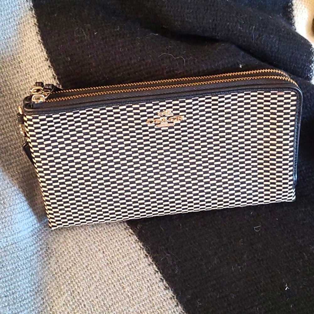 Gently used coach wallet (black and tan)